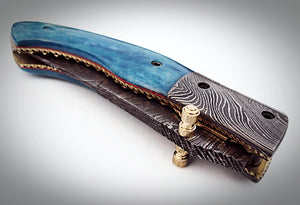 UK-1075, Custom Handmade Damascus Steel Folding Knife - Colored Bone Handle with Damascus Steel Bolsters Amazing File Work.